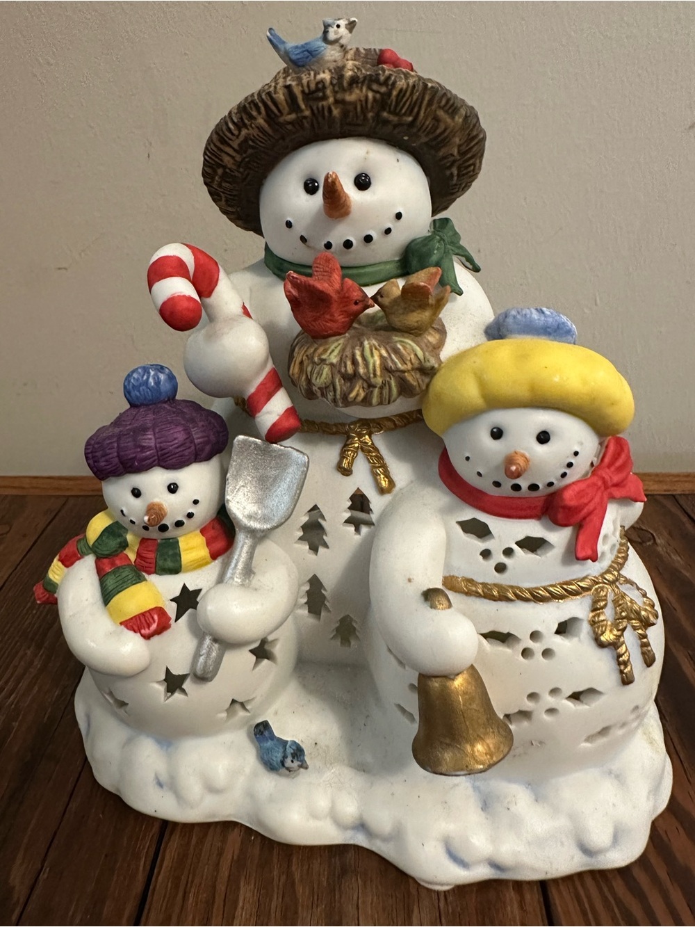Festive Family Snowman Trio Holiday Figurine - White, Red, Yellow, Purple